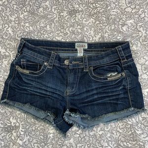 Denim short shorts. Only worn twice. Dark blue with tiger stripes on the front